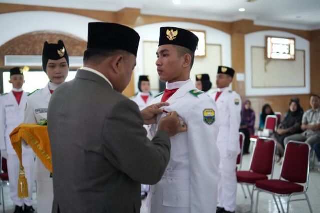 Pelantikan Paskibraka Muaro Jambi 2024: Sekda Budhi Hartono Ajak Jaga Kebersamaan dan Semangat